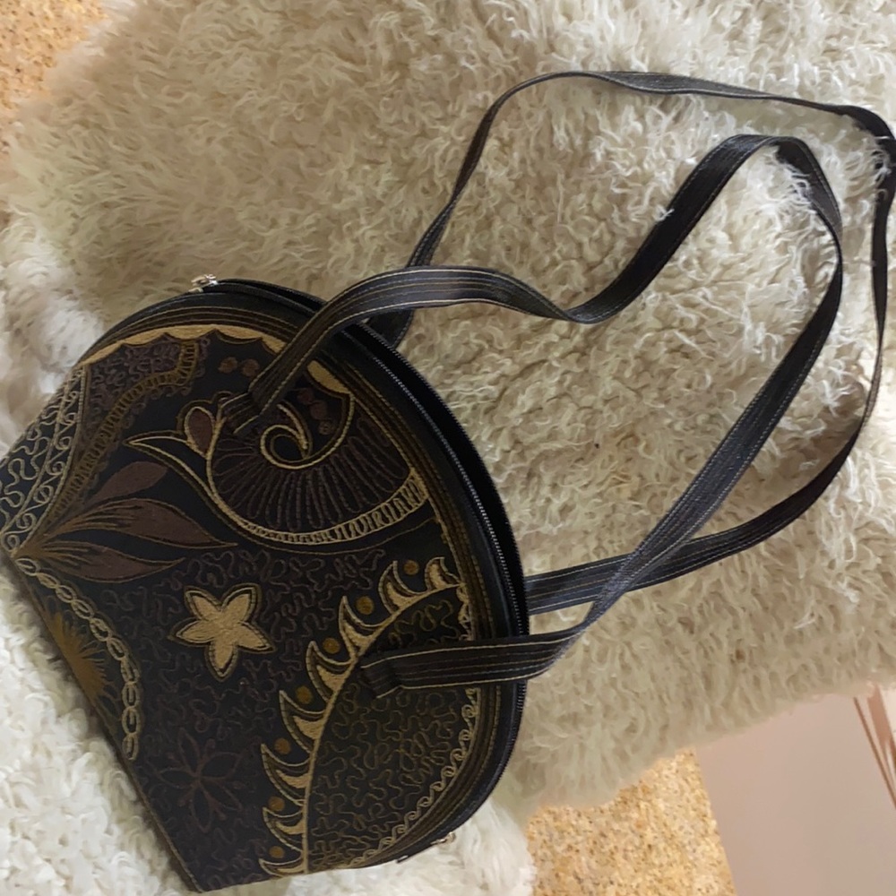 Laga Handbag. Medium. Black with brown stitching